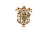 an image of a gold and diamond broochle broochle