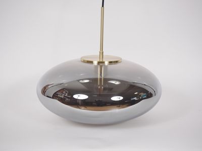 an image of a silver and gold lamp on a white background