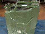 a green plastic container sitting on top of a blue box