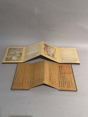 three open books sitting on a table next to each other