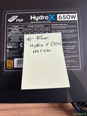 a post it note on the side of a laptop