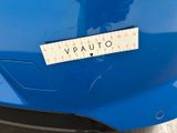 the rear end of a blue car with a sticker that says vauto