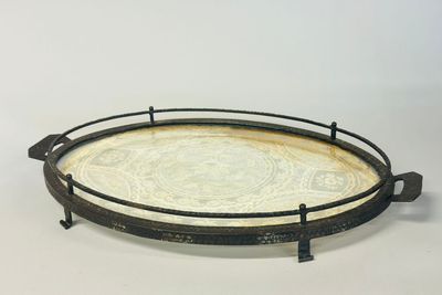 a round tray with a circular design on it