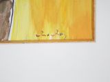 a picture of a painting on the wall above a bed