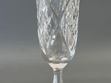 a wine glass that is sitting on a table