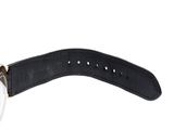 a close up of a watch on a white background