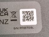 a close up of a qr code on the back of a laptop