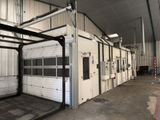 an image of a garage with a lot of doors