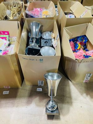 many boxes of different types of items on the floor
