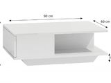 a close up of a white shelf with a box on it
