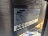 a close up of a samsung refrigerator with a label on it