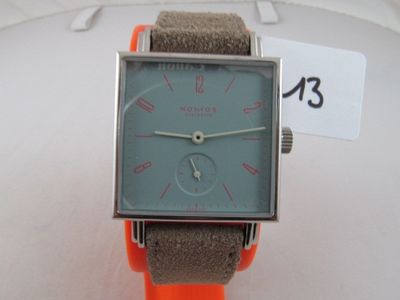 a watch that is sitting on top of a table