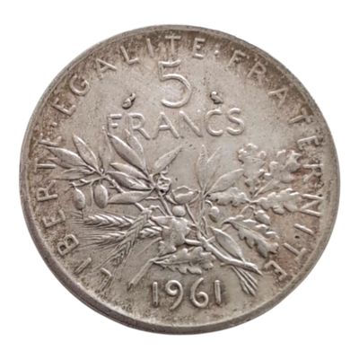 gros plan d'une pièce de monnaie sur fond blanc