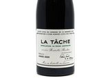 a bottle of wine that is sitting on a table