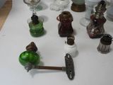 a lot of glass bottles on a white table