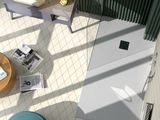 overhead view of a bathroom with a toilet, sink, and mirror