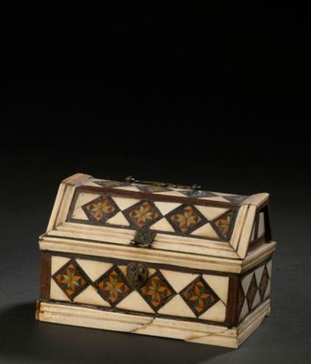 a white and brown box sitting on top of a table