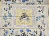 a picture of a table cloth with a picture of a horse and carriage