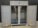 an image of a metal cabinet with doors open