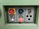 an image of a control panel with buttons and knobs