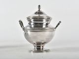 an image of a silver plated urn on a white surface