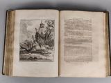 an open book with a picture of a man in a boat on the water