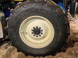 a large tire that is sitting in the dirt