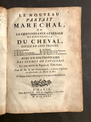 un livre ouvert avec l'image d'un cheval sur sa couverture