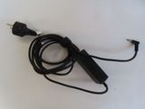 a cord that is connected to a charger on a table