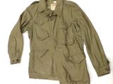 an image of a military jacket on a white background