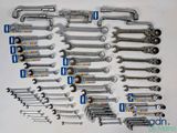 a picture of a bunch of wrenches on a table