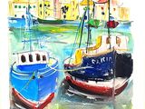 two boats that are sitting in the water