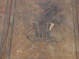 a wooden box with a picture of a bird on it