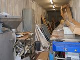a picture of a room with a lot of junk on the floor