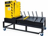 a black cart with a yellow box on top of it
