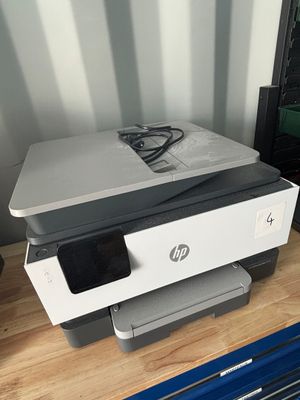 a printer that is sitting on top of a desk