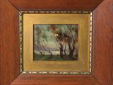 une peinture à l'huile représentant un paysage avec des arbres, dans un cadre en bois