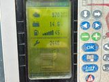 a close up of a parking meter with buttons on it