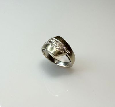 sterling silver ring with diamonds on a white background