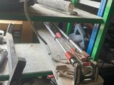 a workbench with tools on it in a room