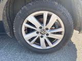 a close up view of a tire on a car