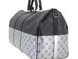 an image of a black and white louis vuitton bag