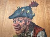 a painting of a man wearing a hat and holding a piece of fruit