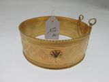 a gold bracelet with a price tag on it