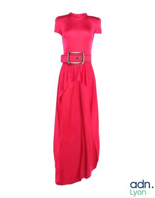 the dress is pink and has a belt on it