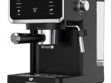 a close up of a black coffee machine on a white background