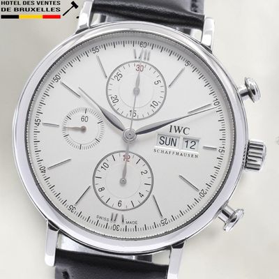 a close up of a wrist watch with a leather strap