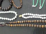 a lot of beads that are on the table
