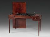 an antique writing desk with drawers and drawers