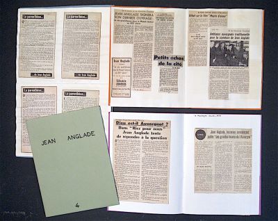 a lot of pages that are open on the table
